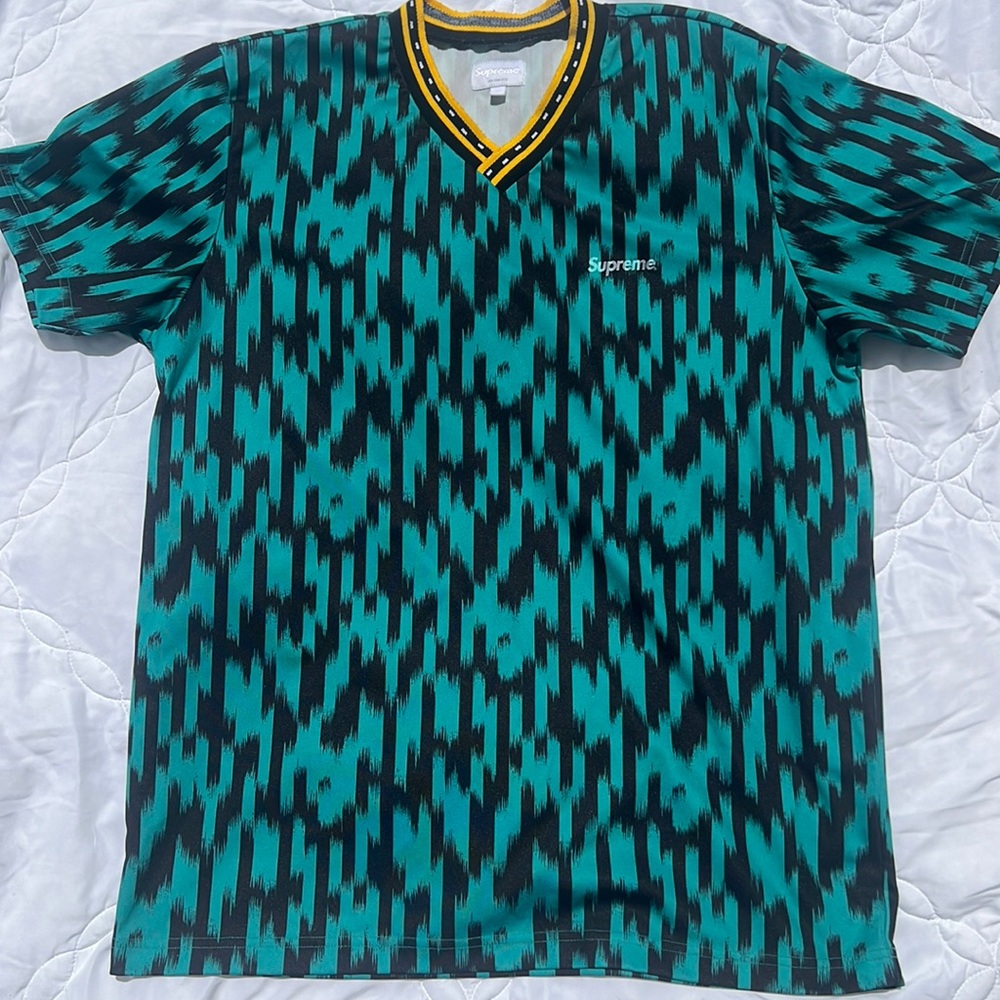 Supreme men’s soccer / football jersey.